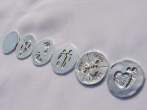 sr5143-zilver-sieraden-munt-roermuntje-hanger-logo's-relatiegeschenk-uniek-edelsmid-handgemaakt-www.tonvandenhout.nl-goudsmid-juwelier-hartje-liefde-lief-geluk-voetjes-voetje-kado