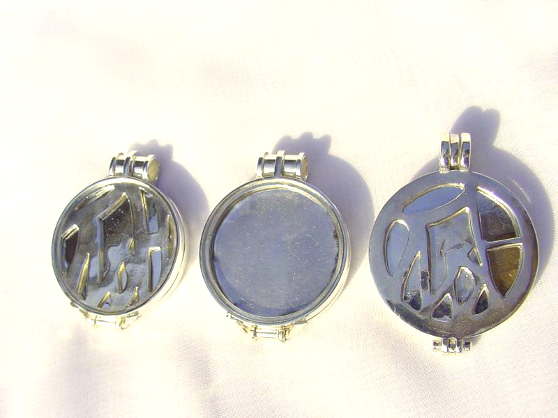 sr5197-zilver-munt-handgemaakt-edelsmid-sieraden-hanger-goudsmid-www.tonvandenhout.nl-logo's-roermuntje-roermond-edelsmeden-vandenhout-uniek-bijzonder-origineel-munthanger